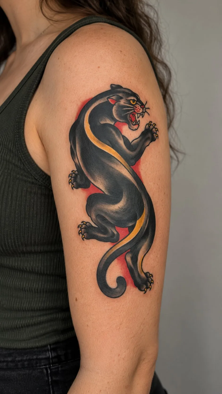 Traditional eagle, snake and skull tattoo on the calf